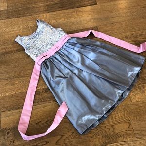 Beautiful Dorissa girls dress, gray sequin top, pink cummerbund sash